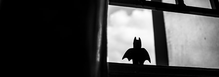 A Windows With a Batman Toy